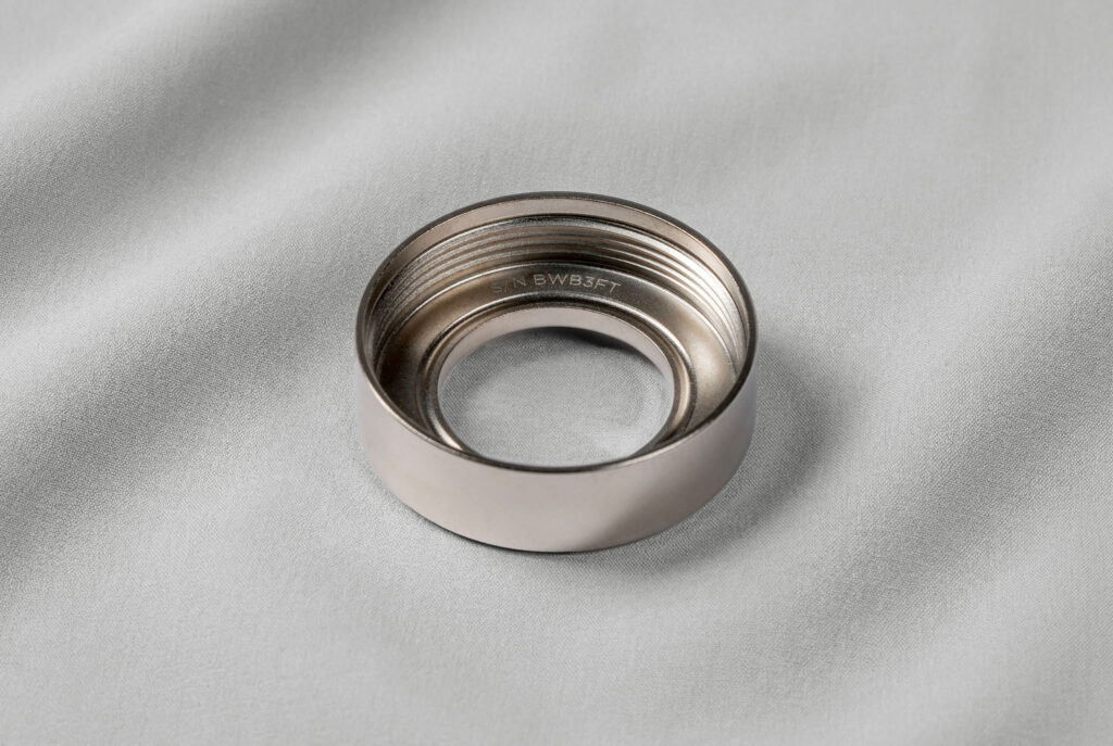 Stainless steel Elzetta bezel showing its inner lip